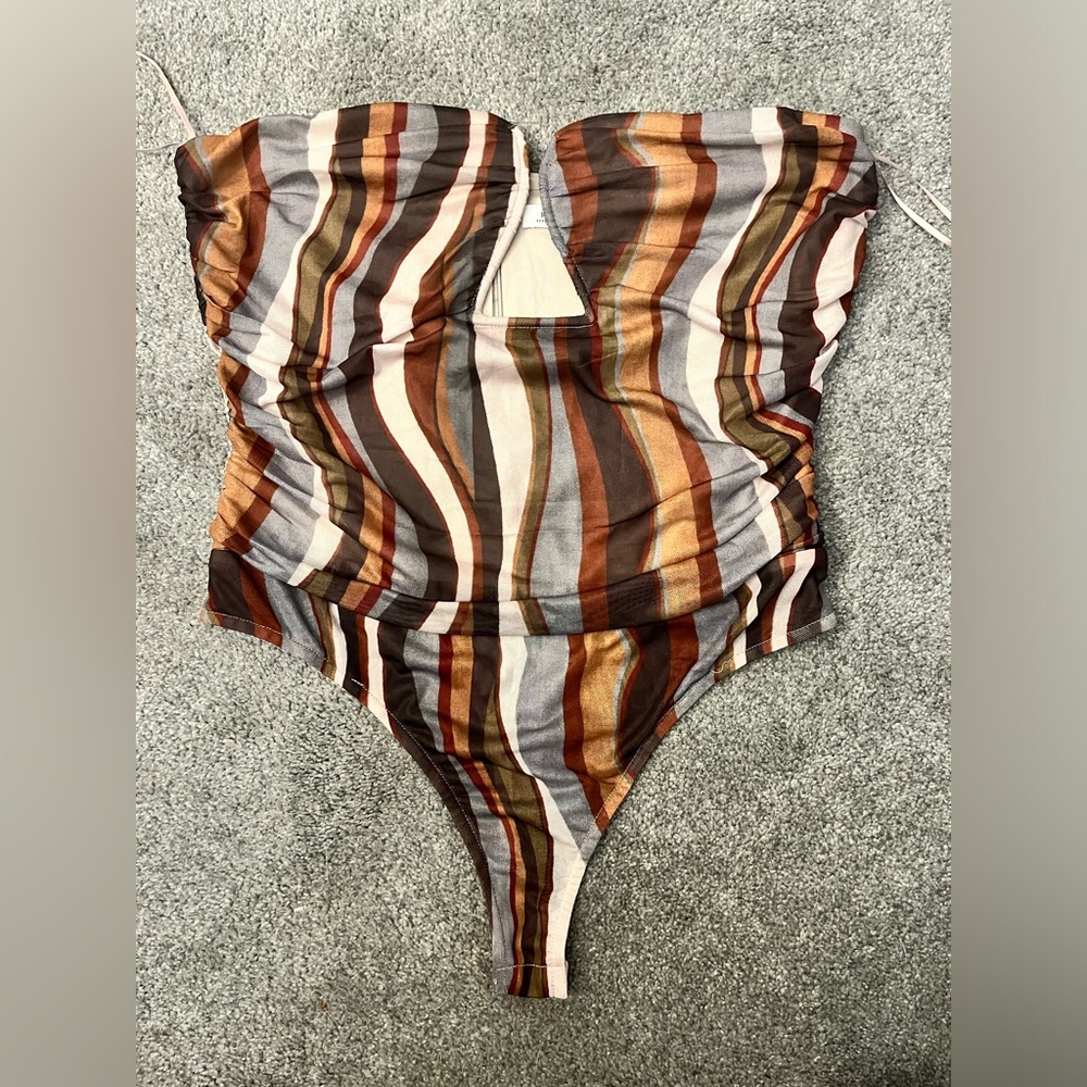 NWOT Large 12th Tribe Bodysuit